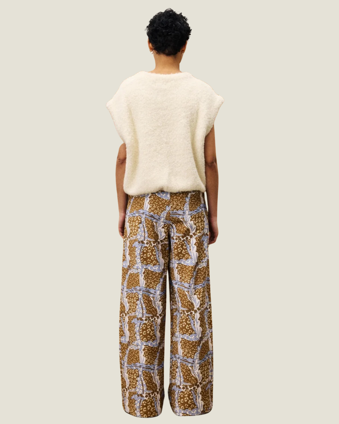 The Loki Patterned Trousers for your elevated everyday style. These autumn tone trousers are the chicest statement piece in your closet.