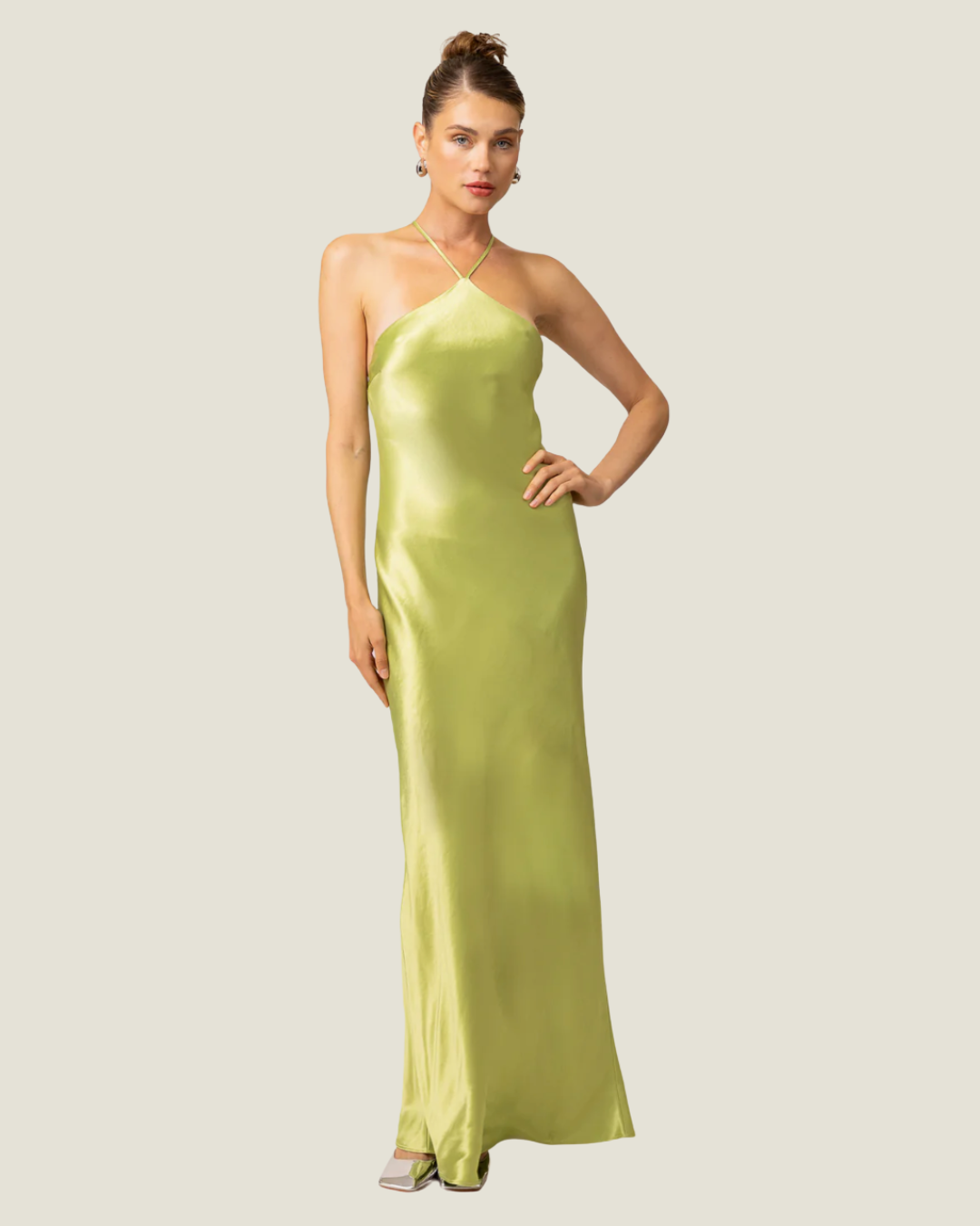 The Lima- lime halter satin maxi dress from Love Celine women’s boutique in SWFL.