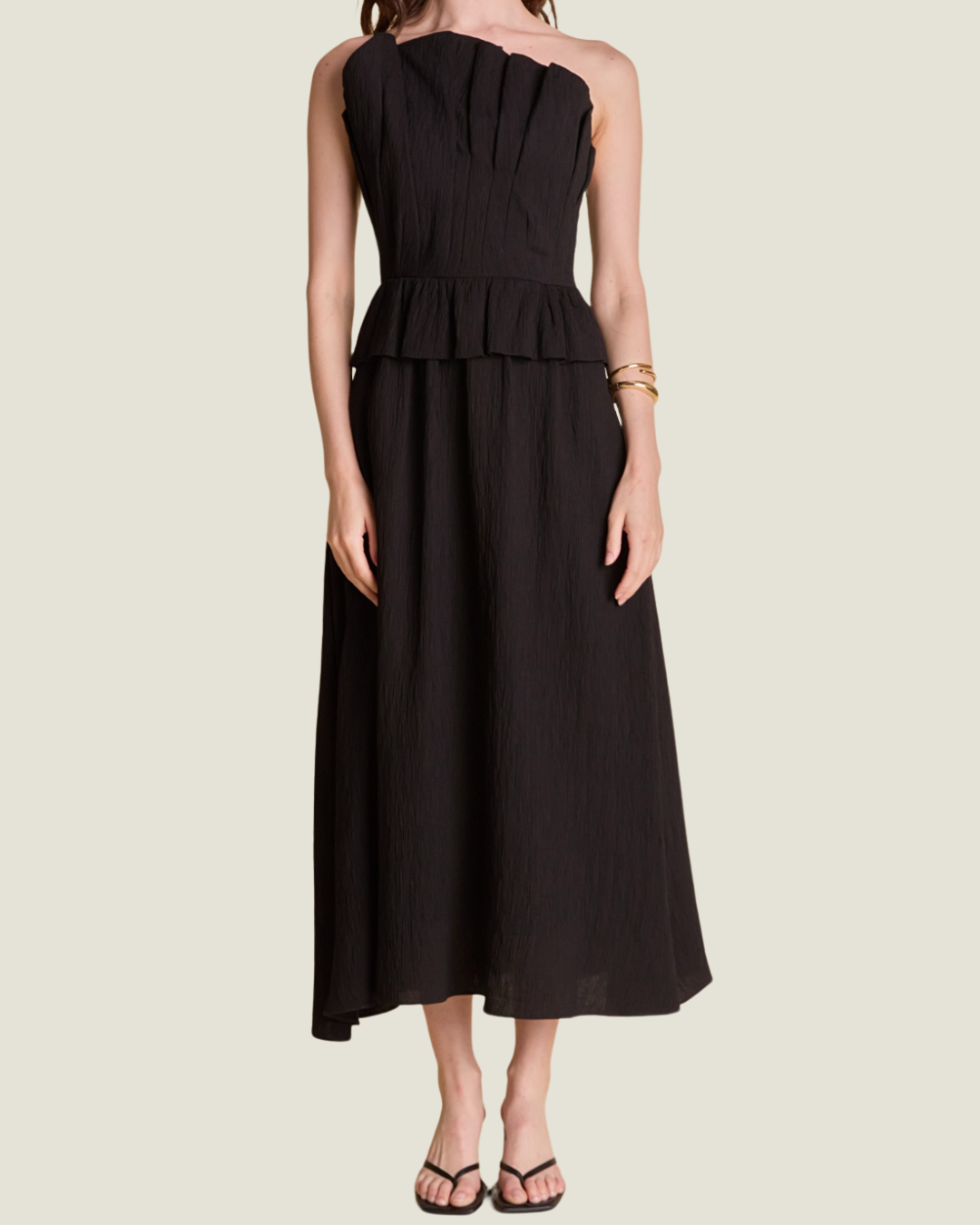 The Shyla-a black linen midi dress from Love Celine women’s boutique in SWFL.