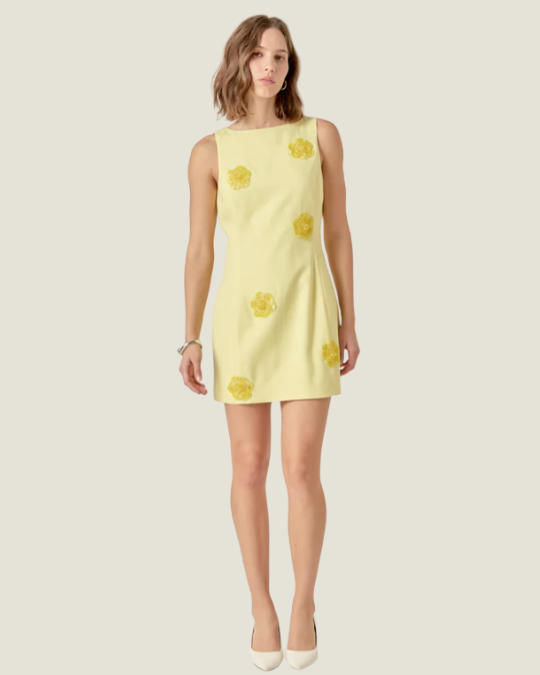 Jayden Embellished Linen Mini Dress- a butter yellow mini dress made with floral embellished detail. Available at Love Celine a women’s boutique in SWFL.