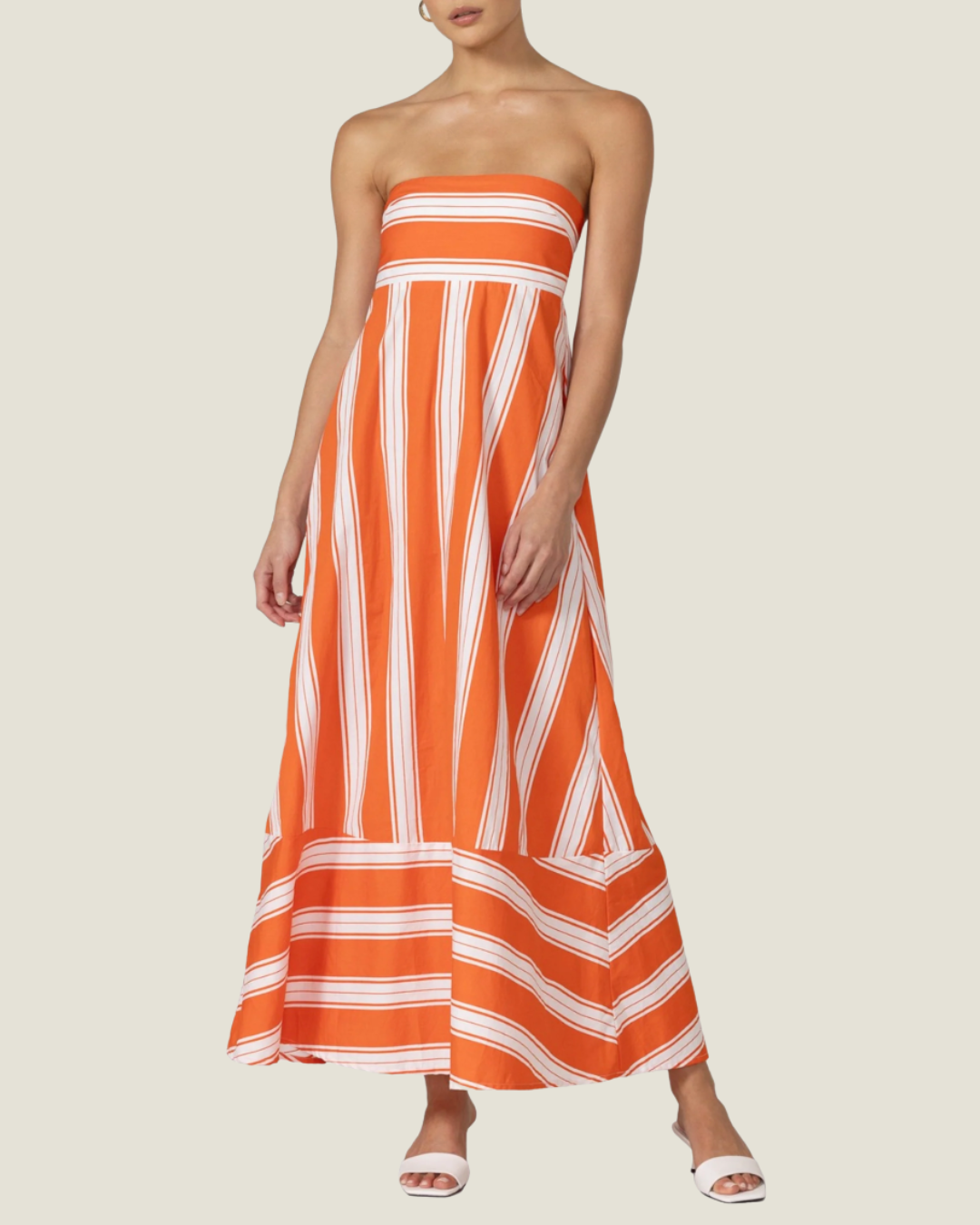 The Waverly: Strapless Poplin Striped Maxi Dress by Lusana is a striped poplin maxi dress available at Love Celine women’s boutique in SWFL.