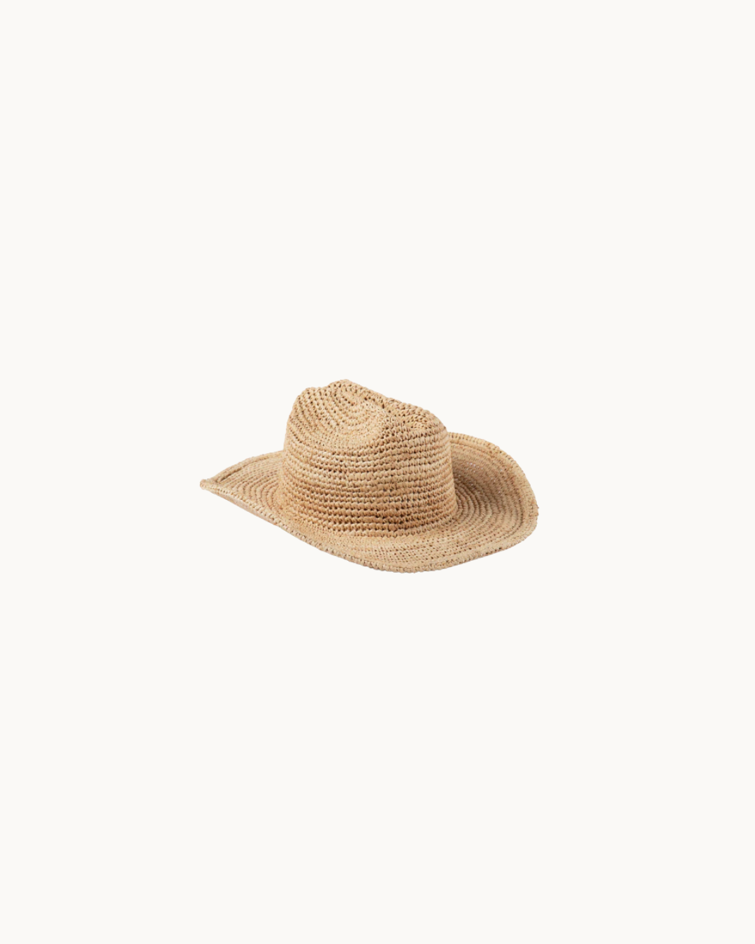 Raffia Cowboy Hat– a crochet relaxed fit cowboy hat by Lack of Colors available at Love Celine a women’s boutique in SWFL.