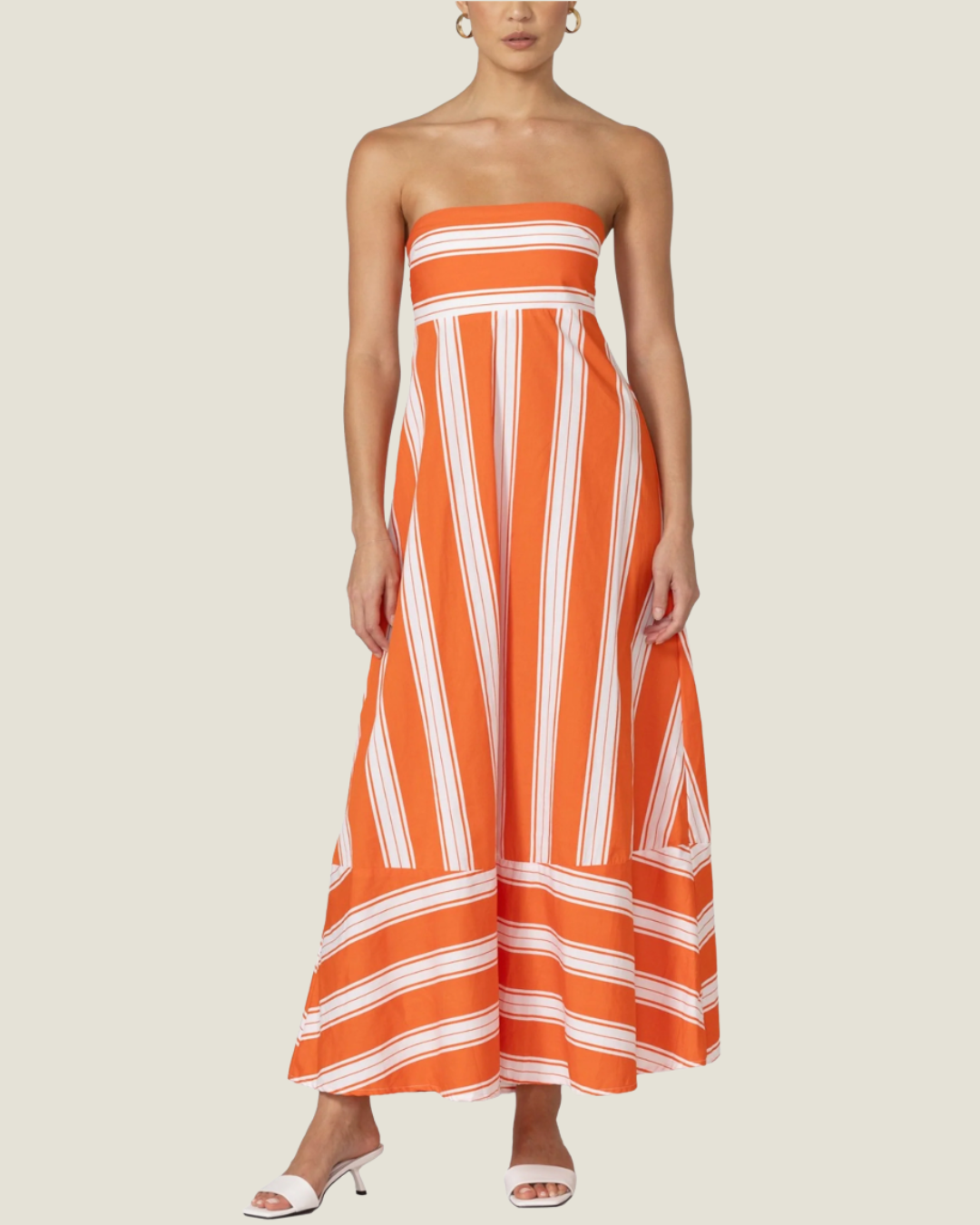 The Waverly: Strapless Poplin Striped Maxi Dress by Lusana is a striped poplin maxi dress available at Love Celine women’s boutique in SWFL.