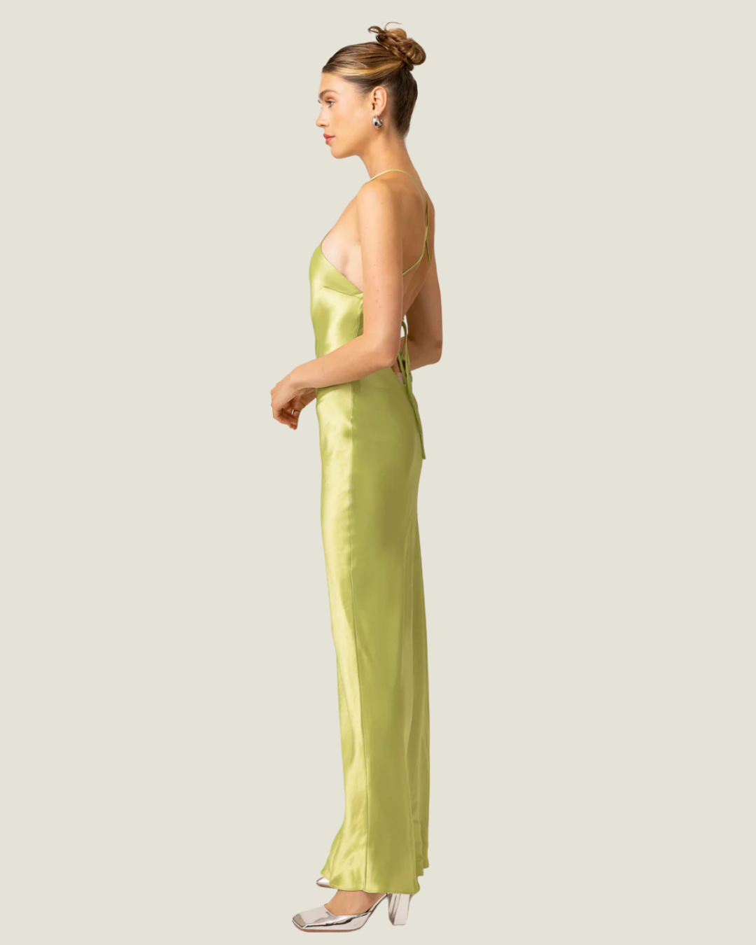 The Lima- lime halter satin maxi dress from Love Celine women’s boutique in SWFL.