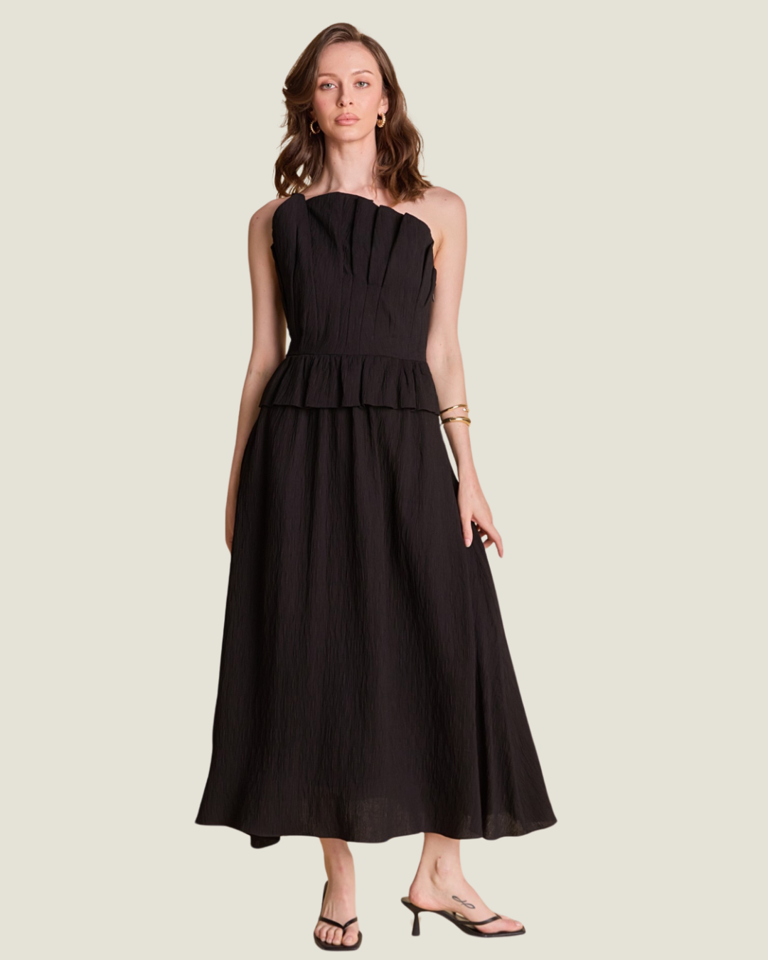 The Shyla-a black linen midi dress from Love Celine women’s boutique in SWFL.