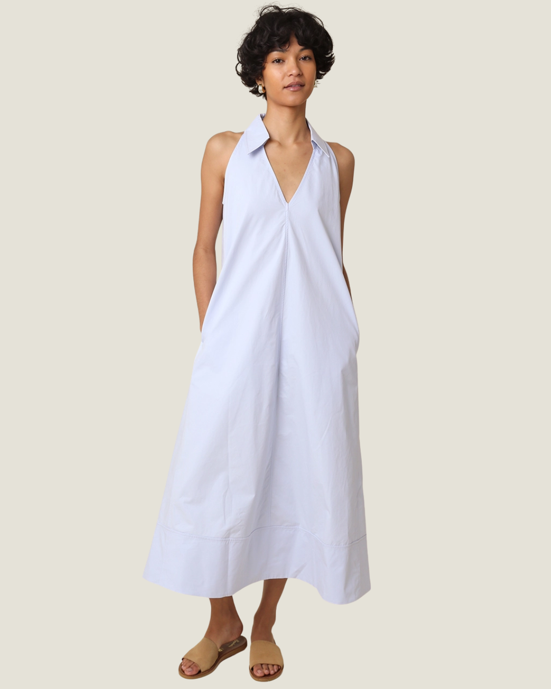 Light blue collared sleeveless midi dress for spring.