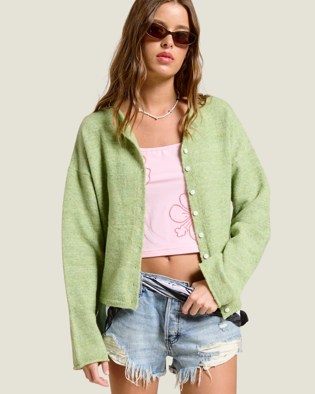 Green slightly knit oversized cardigan. 