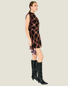 Women's Kristopher Plaid Mini Dress by Line & Dot featuring a plaid print, mock neckline, short sleeves, lace trim, and asymmetric hem.