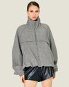 Women's Archie Plaid Jacket featuring a relaxed fit, zip-front closure, front zipper pockets, and adjustable drawstring waist.