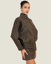 Women's Millie Polka Dot Tweed Jacket by Line & Dot featuring flocked polka dots, padded shoulders, a mock neckline, and button-front closure.
