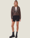 Brown women's fringe cardigan featuring long sleeves, statement fringe detailing, and a classic button-down front.