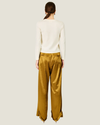 Women's Barrett Satin Pants featuring a wide-leg silhouette, pleated detailing, hip slant pockets, and adjustable ankle ties.