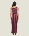 One-shoulder knit maxi dress with multi-directional stripes, twisted off-shoulder strap, and side leg split.