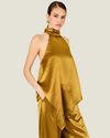 Women's Barrett Satin Halter Top featuring a sleeveless silhouette, adjustable self-tie neckline, and smooth satin finish.