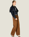 Women's Roxie Cape Jacket featuring a structured twill silhouette, optional cape detail, classic collar, button cuffs, and flap front pockets.