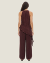 Women's Eadie Asymmetrical Draped Top in green and purple, featuring a silky satin finish, cowl neckline, and statement asymmetric flounce hem.