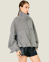 Women's Archie Plaid Jacket featuring a relaxed fit, zip-front closure, front zipper pockets, and adjustable drawstring waist.