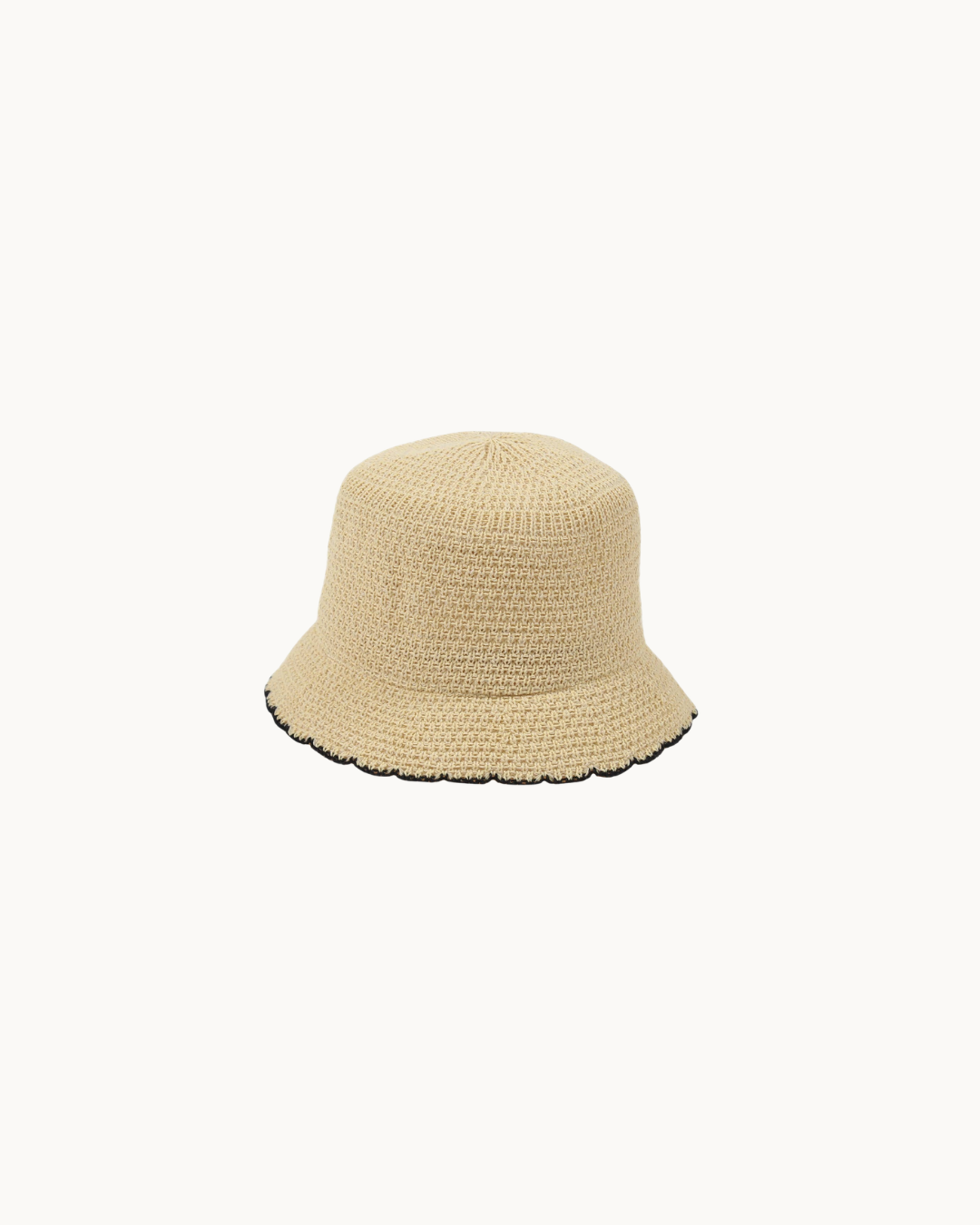 Knit bucket hat with black trim for Spring/Summer. 