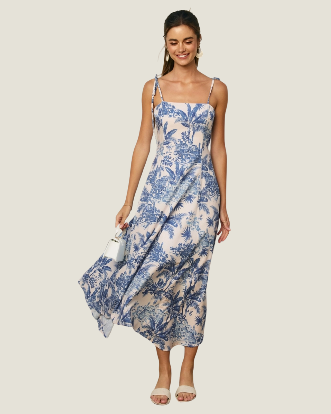 Blue and white coastal inspired toile print midi dress. 