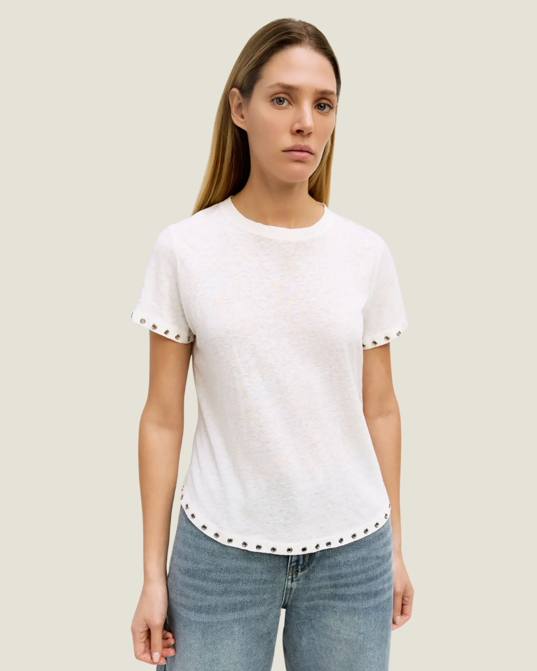 Classic white tee with rivet detailing on the hem. 