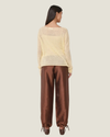 Women's taffeta drawstring pants with a relaxed fit, adjustable waist, tie-leg detailing, and patch pockets.