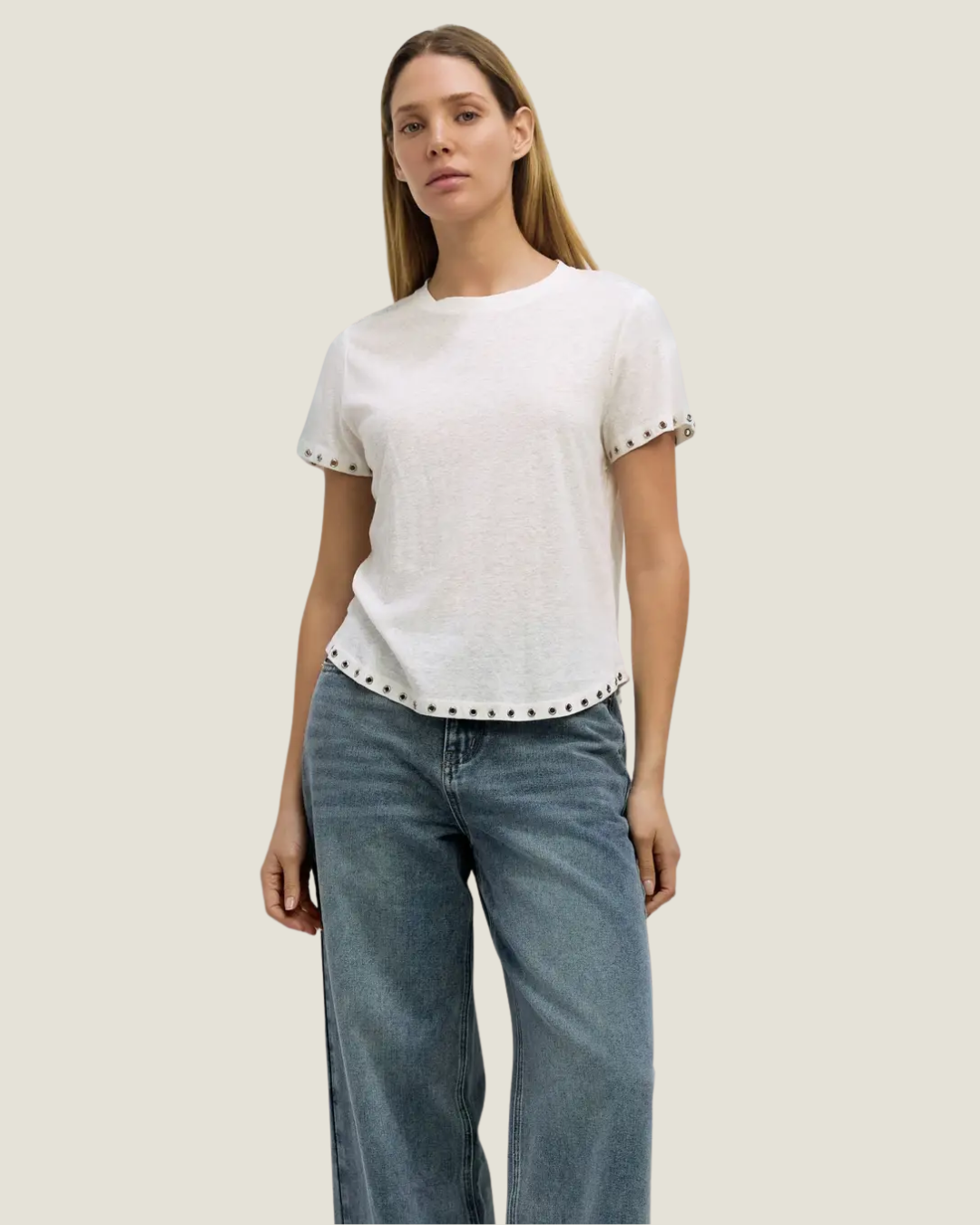Classic white tee with rivet detailing on the hem. 