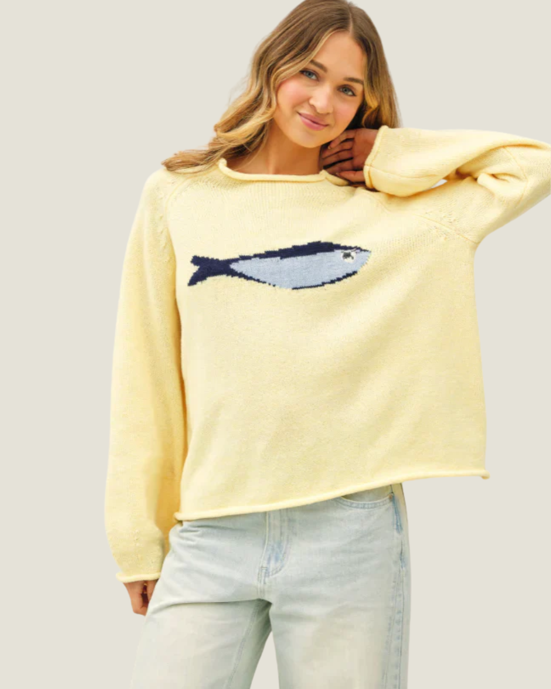 Butter yellow knit oversized sweater with knitted sardine design.