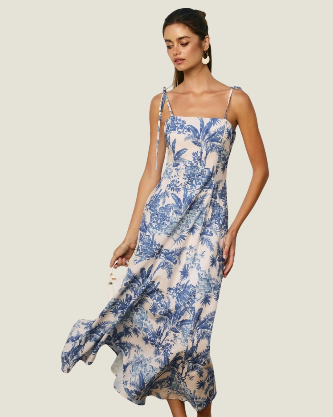 Blue and white coastal inspired toile print midi dress. 