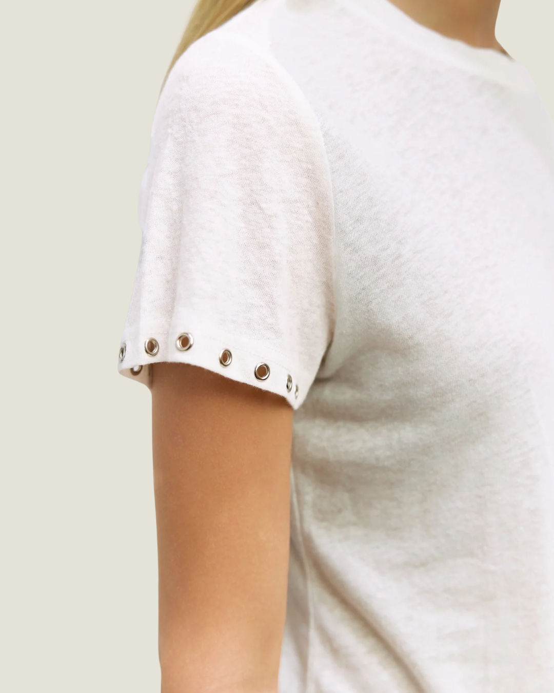 Classic white tee with rivet detailing on the hem. 