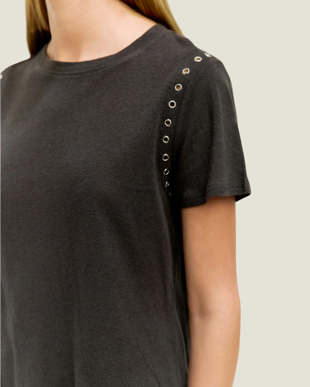 Black relaxed fit t-shirt with rivet detailing around armholes.