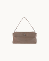Fossil suede Vela shoulder bag with silver hardware detailing and a sleek, structured silhouette.