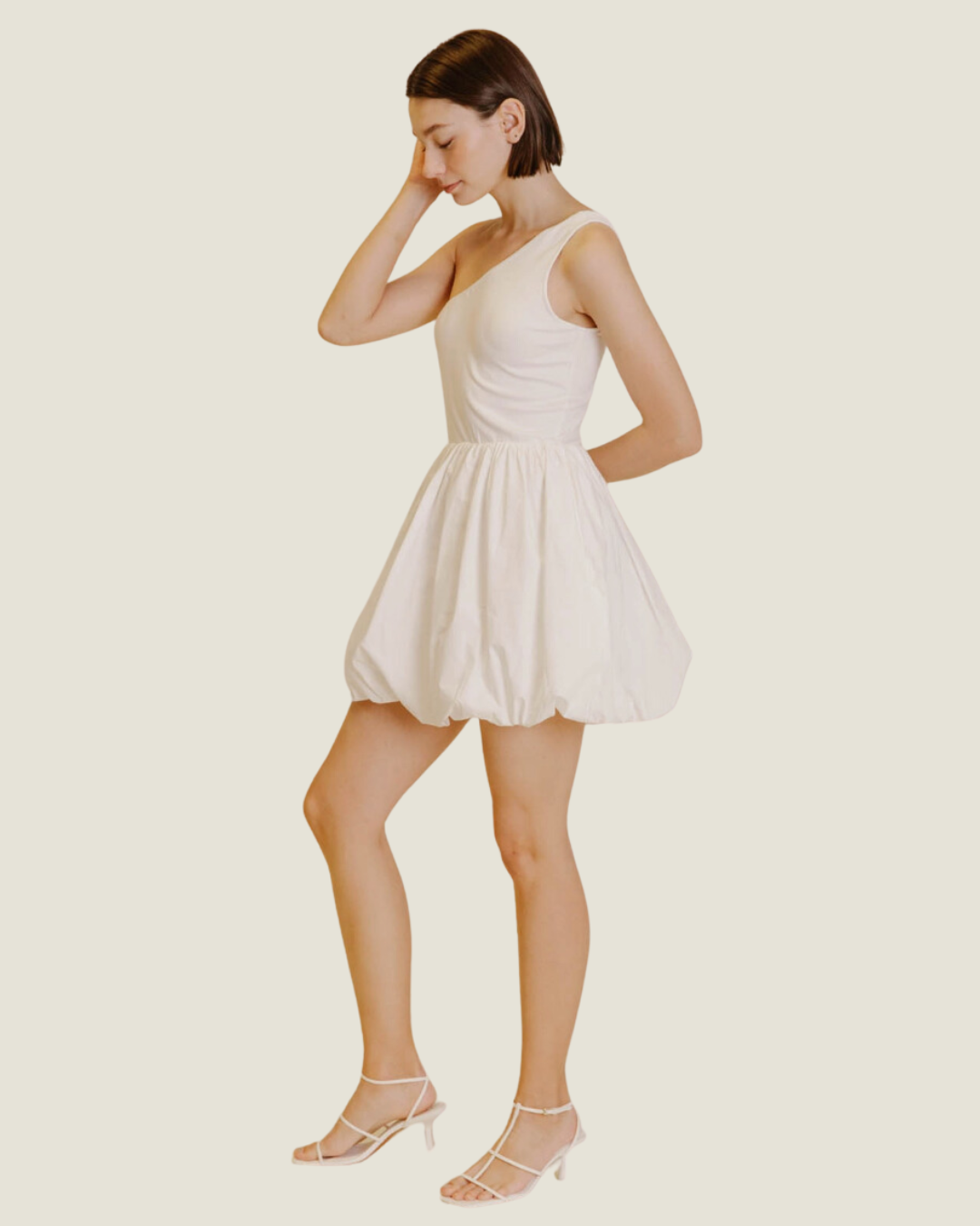 The Sorelle: White One Shoulder Bubble Hem Mini Dress