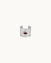 Matilde Cuff by Heaven Mayhem in silver with a deep burgundy enamel center and bold architectural design.
 Copy alt text