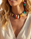 Handmade multicolor resin bead statement necklace with glossy earth-tone beads, mocha vegan suede cord, and vintage gold-plated hardware.
