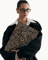 Heaven Mayhem Laptop Sleeve in zebra faux mohair featuring a structured envelope-inspired design and spacious interior for a laptop and daily essentials.