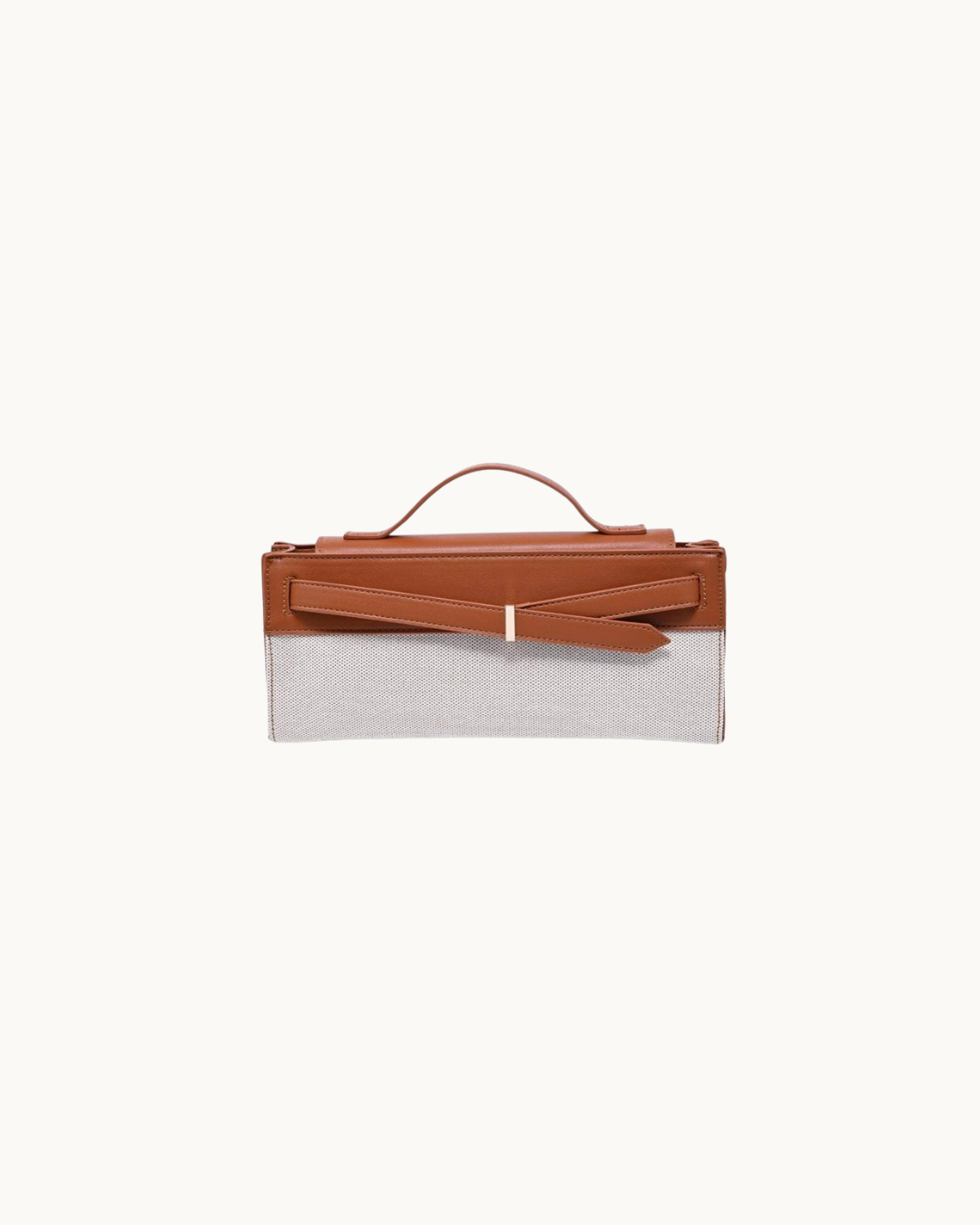 Tan and ivory vegan leather top-handle clutch. 