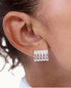 Heaven Mayhem Clemmie silver stud earrings featuring a ribbed texture, curved silhouette, and polished silver PVD plating.