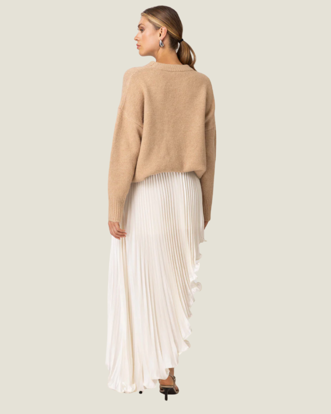 Seymour Asymmetrical Pleated Midi Skirt– a statement asymmetrical pleated ivory skirt by Line & Dot available at Love Celine a women’s boutique in SWFL.