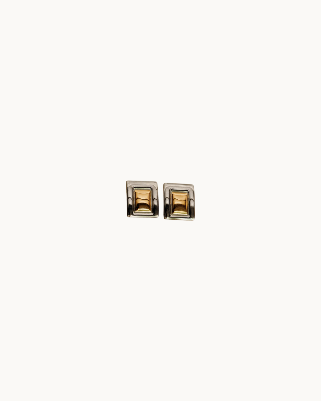 The Stetson Two Toned Oversized Earrings are a part of your modern capsule wardrobe pieces! 