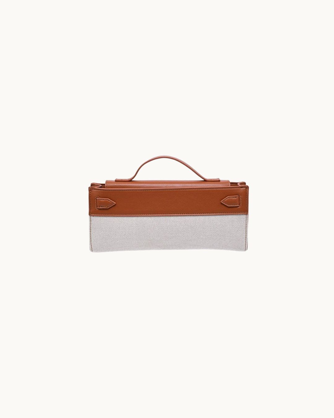 Tan and ivory vegan leather top-handle clutch. 