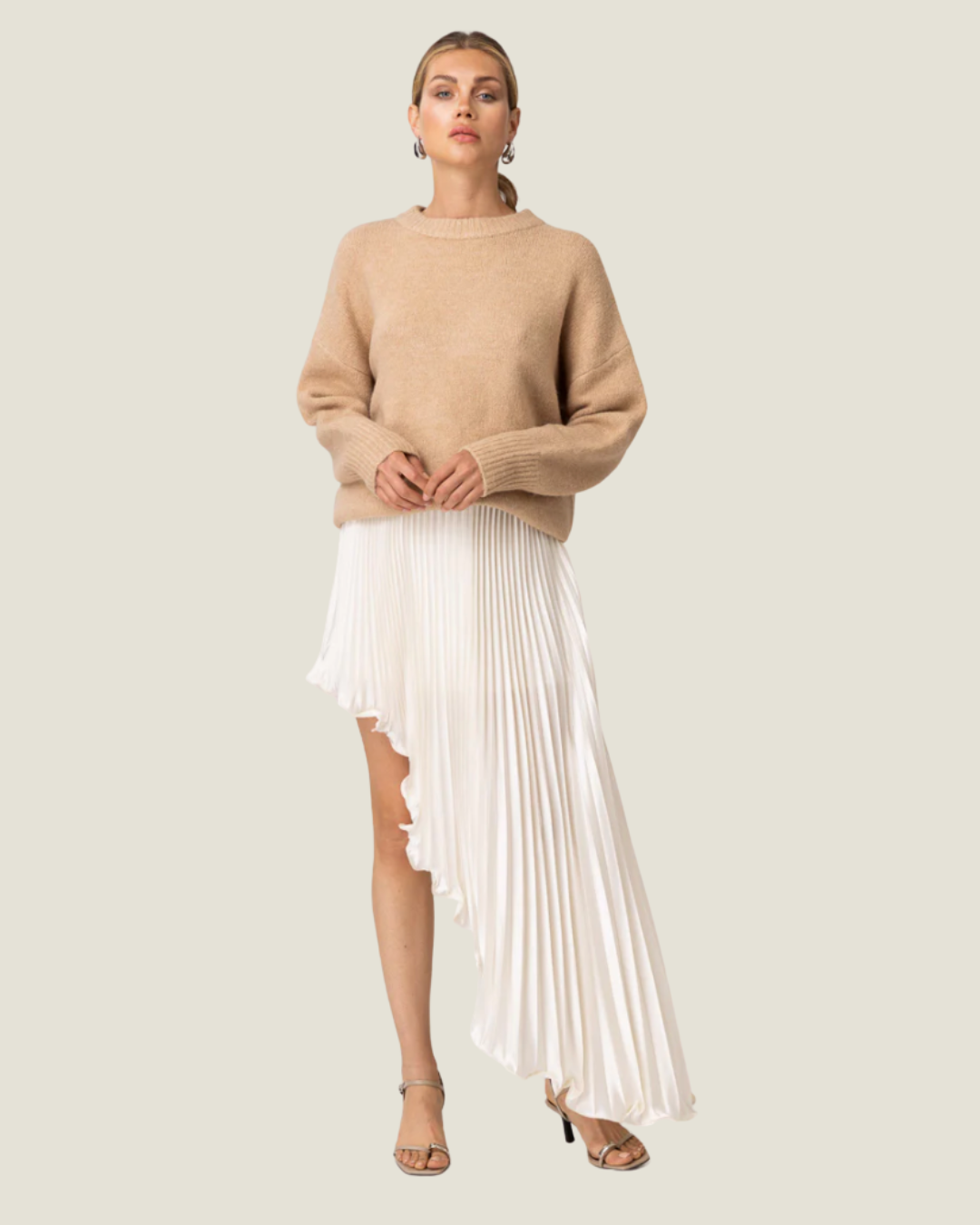 Seymour Asymmetrical Pleated Midi Skirt– a statement asymmetrical pleated ivory skirt by Line & Dot available at Love Celine a women’s boutique in SWFL.
