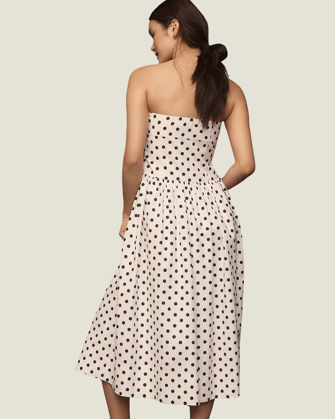 The Juliana Strapless Polkadot Midi Dress- a strapless dress with a drop waist by Endless Rose.Available at Love Celine a women’s boutique in SWFL.