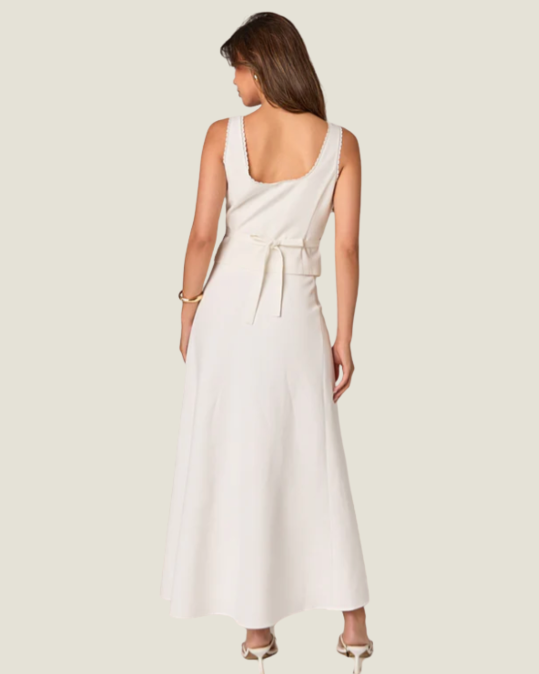 The Sunday: Lace Trim Linen Top-a white linen top from Love Celine women’s boutique in SWFL.