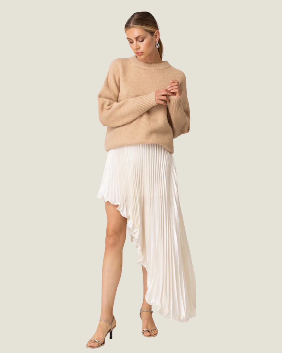 Seymour Asymmetrical Pleated Midi Skirt– a statement asymmetrical pleated ivory skirt by Line & Dot available at Love Celine a women’s boutique in SWFL.