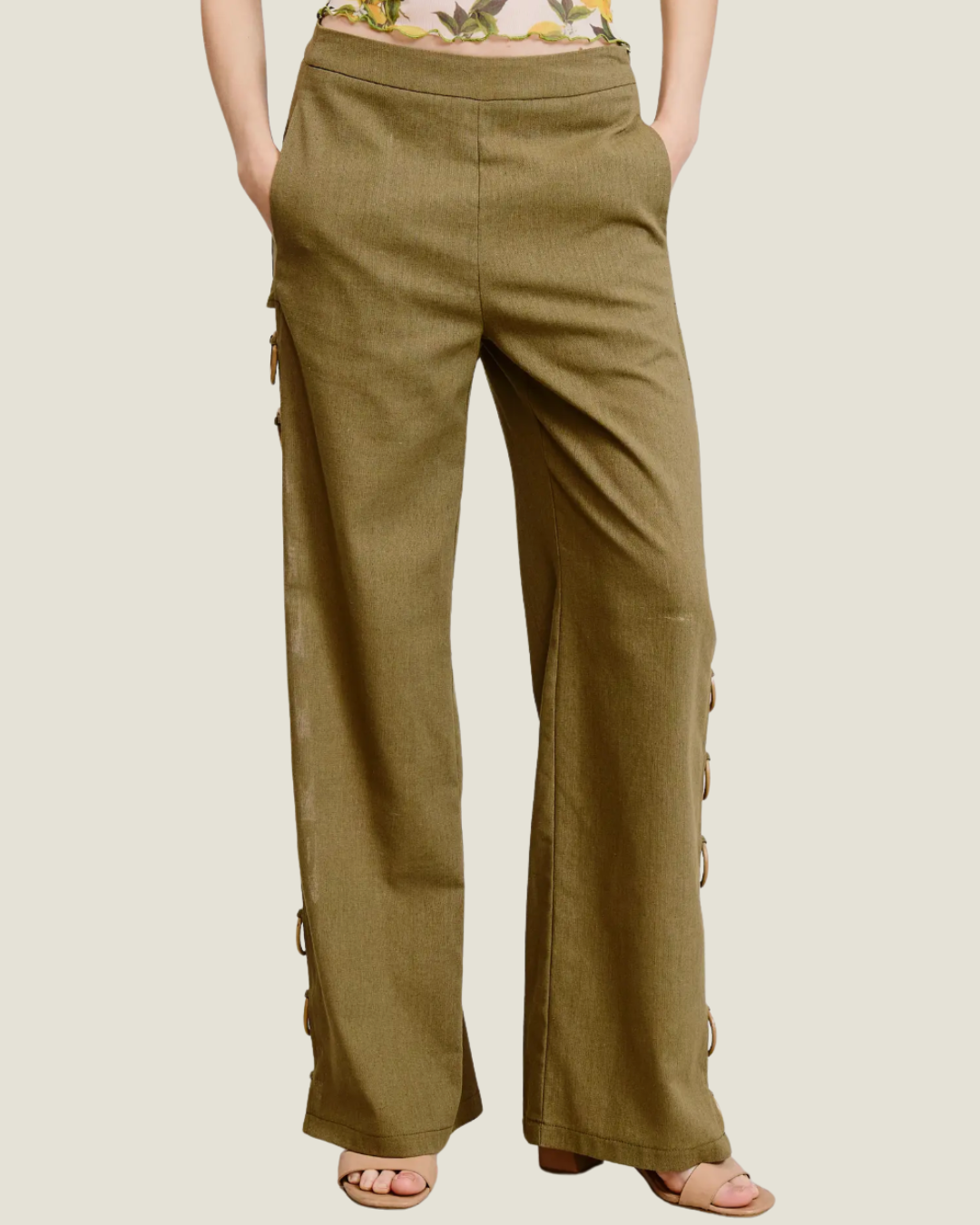 Clara Linen Ring Detail Wide Leg Pants- a bold hunter green linen pant made to stand-out. Available at Love Celine a women’s boutique in SWFL.