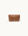 Angela tan vegan leather envelope crossbody bag with gold-tone hardware, detachable chain strap, and magnetic closure.