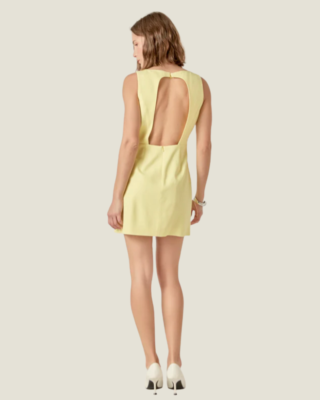 Jayden Embellished Linen Mini Dress- a butter yellow mini dress made with floral embellished detail. Available at Love Celine a women’s boutique in SWFL.