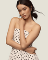 The Juliana Strapless Polkadot Midi Dress- a strapless dress with a drop waist by Endless Rose.Available at Love Celine a women’s boutique in SWFL.