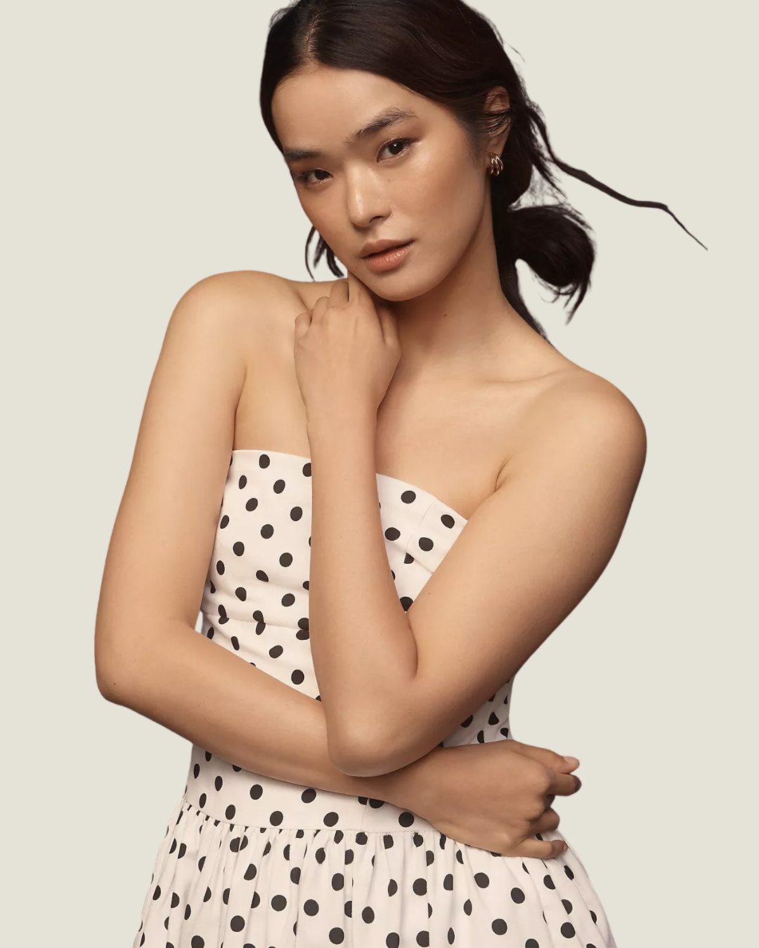 The Juliana Strapless Polkadot Midi Dress- a strapless dress with a drop waist by Endless Rose.Available at Love Celine a women’s boutique in SWFL.