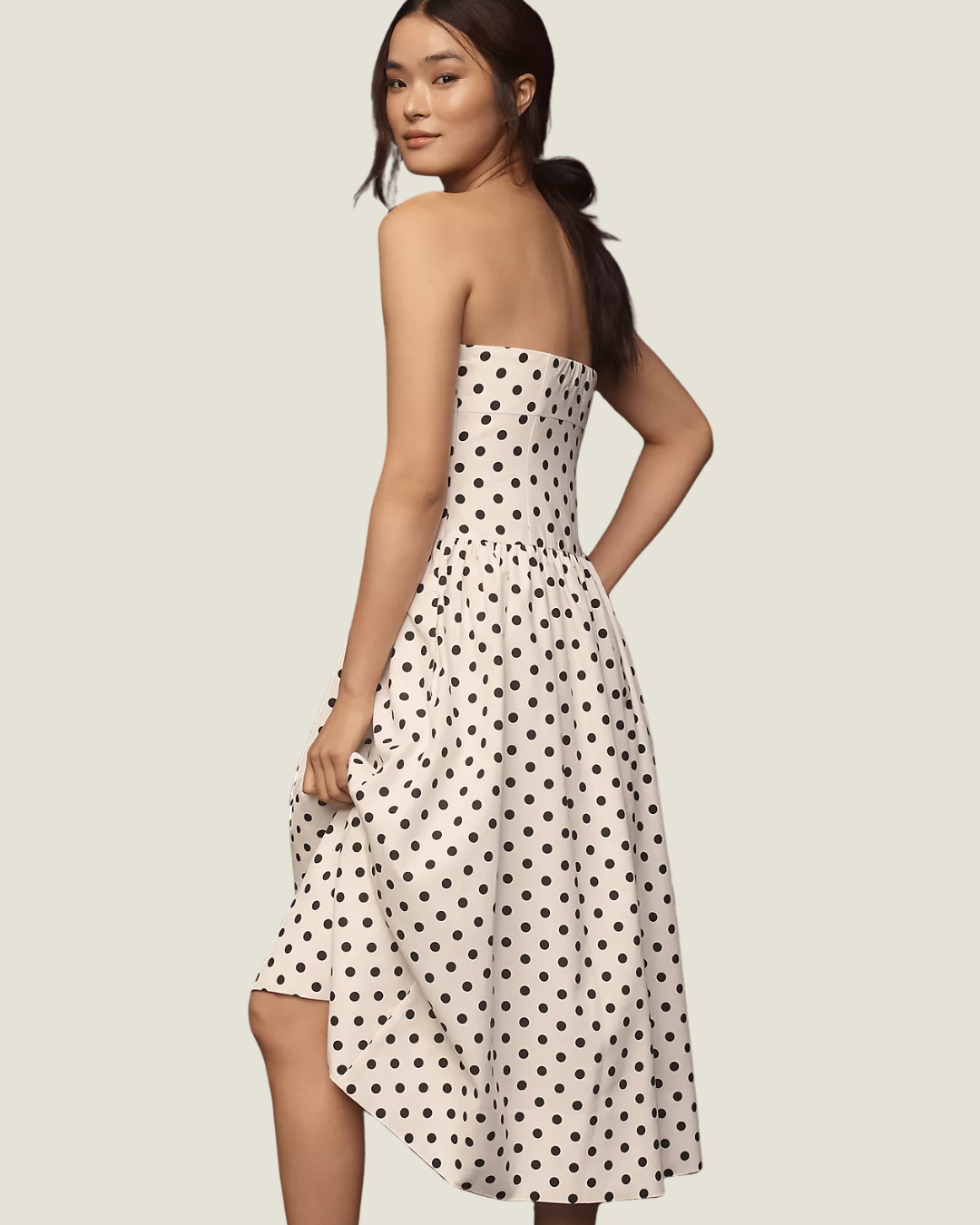 The Juliana Strapless Polkadot Midi Dress- a strapless dress with a drop waist by Endless Rose.Available at Love Celine a women’s boutique in SWFL.